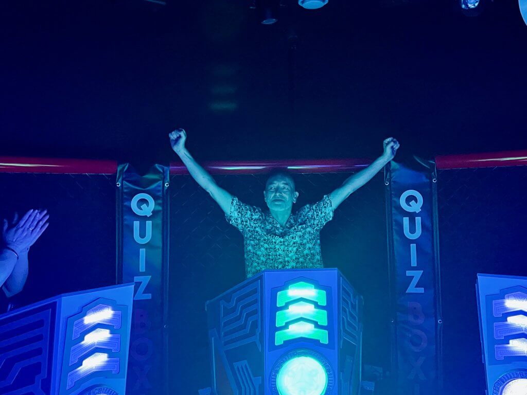 A stag celebrating victory inside Quiz Boxing at Prison Island Belfast